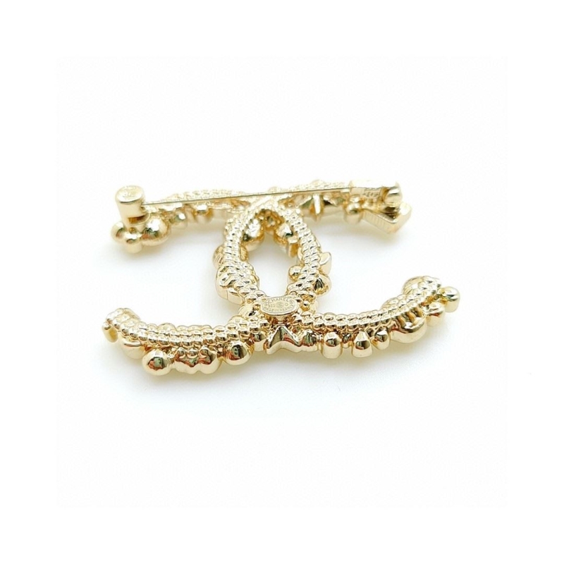 Ch**el brooches